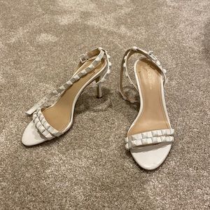 BCBG white stud pumps